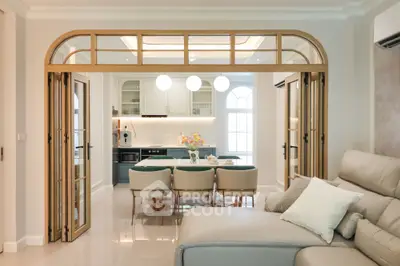 Luxurious open-plan living room with elegant kitchen and stylish furniture
