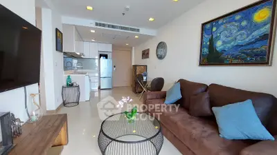 Modern living room with stylish decor and open kitchen layout