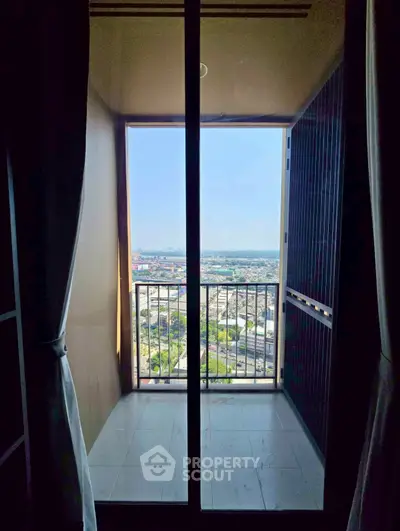 Stunning high-rise balcony view overlooking the cityscape, perfect for urban living enthusiasts.