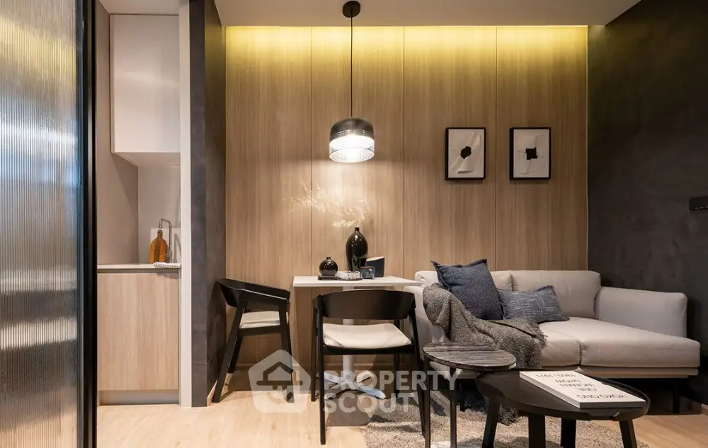 Modern living room with cozy sofa and stylish decor in open layout apartment