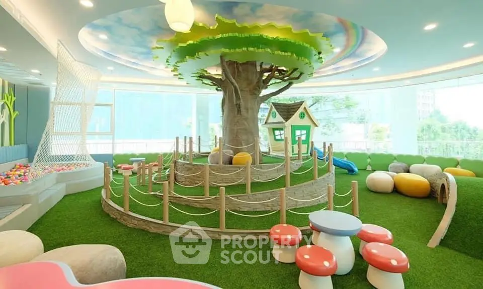 Vibrant indoor play area with tree centerpiece and colorful seating in modern building.
