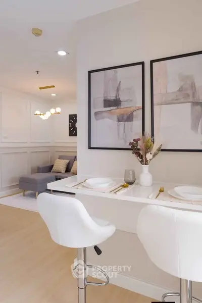 Modern open-plan living room with stylish decor and dining area