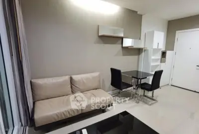 Modern living room with sleek furniture and neutral tones, perfect for urban living.