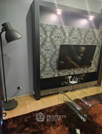 Stylish living room with modern TV setup and elegant decor