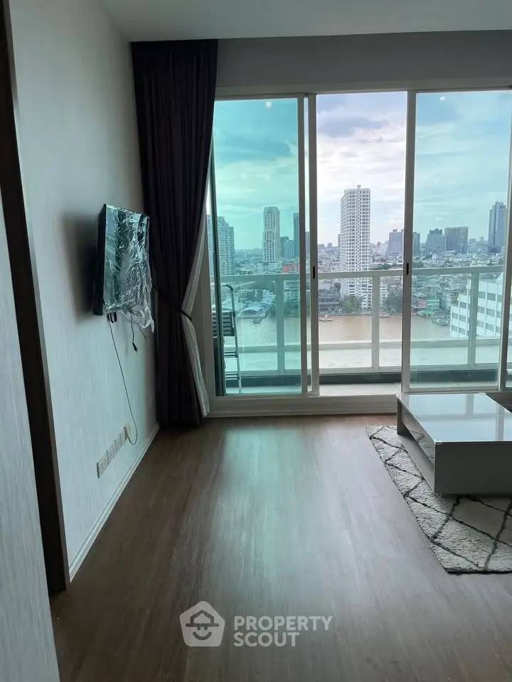 Spacious living room with stunning city view and modern decor