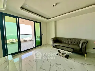 Modern living room with marble flooring and balcony view