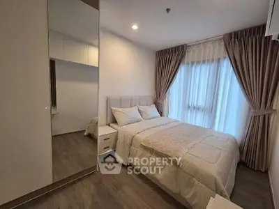 Cozy modern bedroom with elegant curtains and soft lighting