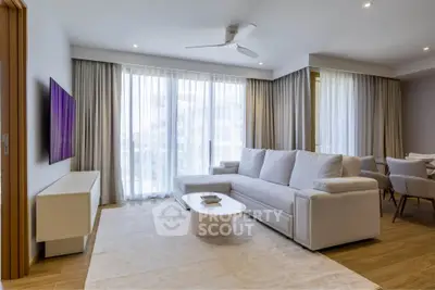 Spacious modern living room with elegant decor and natural light
