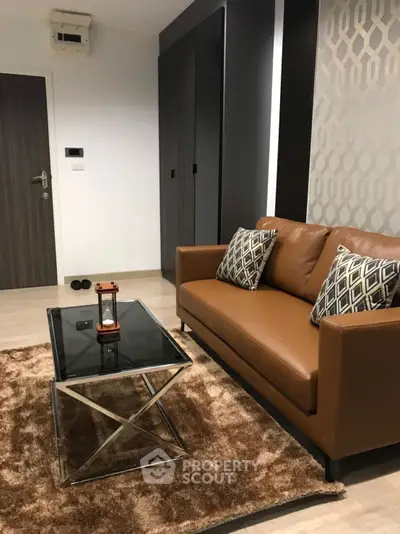 Stylish modern living room with leather sofa and elegant decor