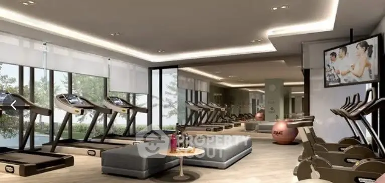 Luxurious gym with modern equipment and scenic views in upscale residential building.