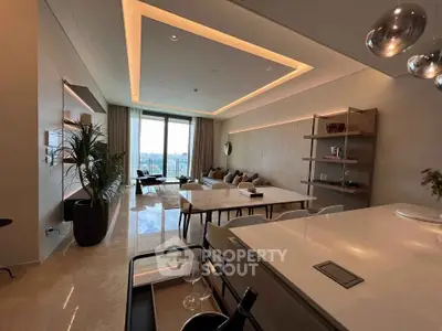 Luxurious modern living room with elegant lighting and spacious open layout, featuring a stunning view.