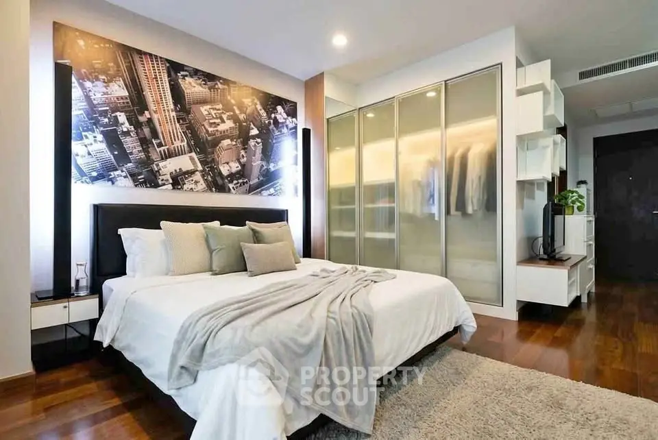Luxurious bedroom with stylish decor and spacious wardrobe