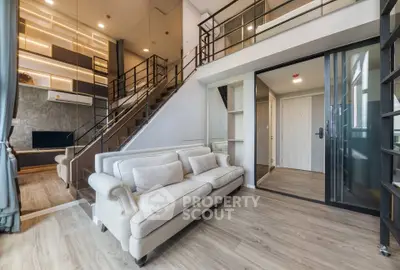 Modern loft apartment with stylish mezzanine and cozy living area