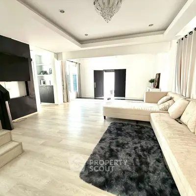 Spacious modern living room with elegant decor and natural light