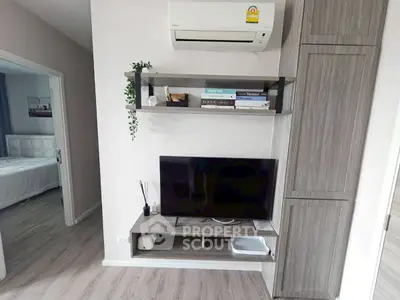 Modern living room with air conditioning and stylish shelving unit
