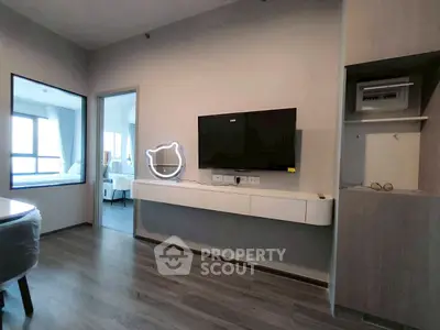 Modern living room with sleek TV setup and stylish decor