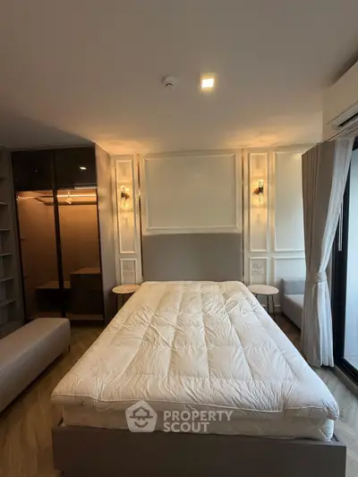 Modern bedroom with cozy lighting and spacious walk-in closet