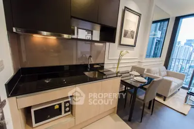 Modern kitchen and living area with city view in luxury apartment