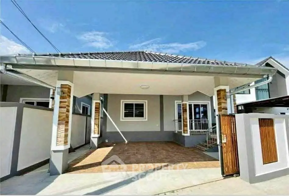 Charming single-story home with covered carport and modern exterior design.