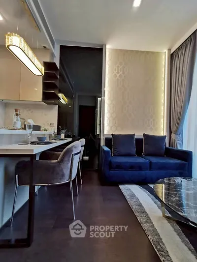 Luxurious modern living room with elegant decor and open kitchen layout
