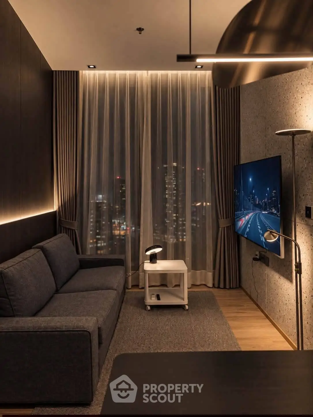 Modern living room with city view, sleek furniture, and ambient lighting.