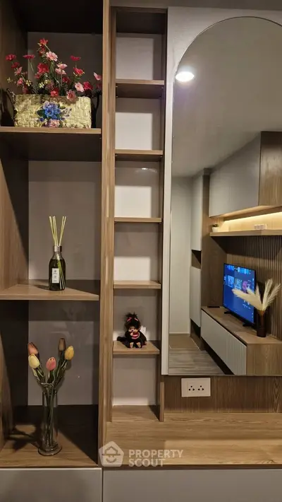 Modern living room with stylish shelving and decorative accents