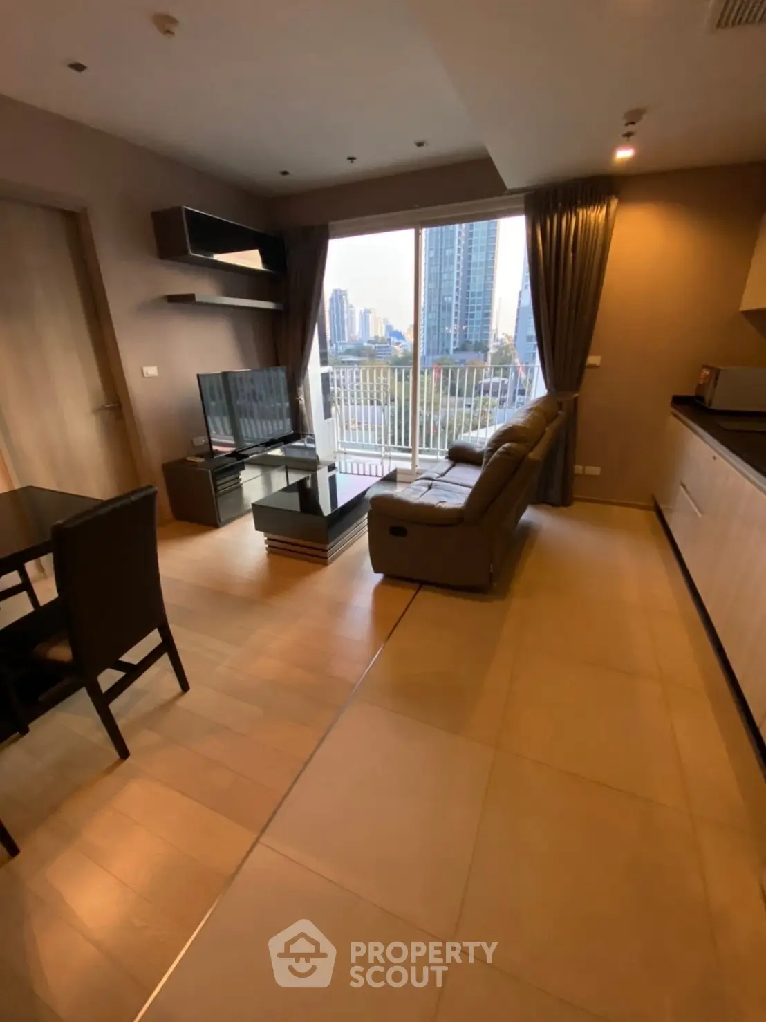Modern living room with city view and stylish furniture