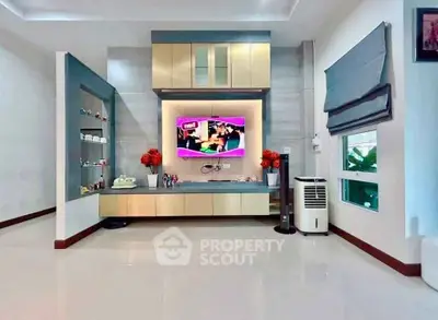 Modern living room with sleek entertainment center and stylish decor