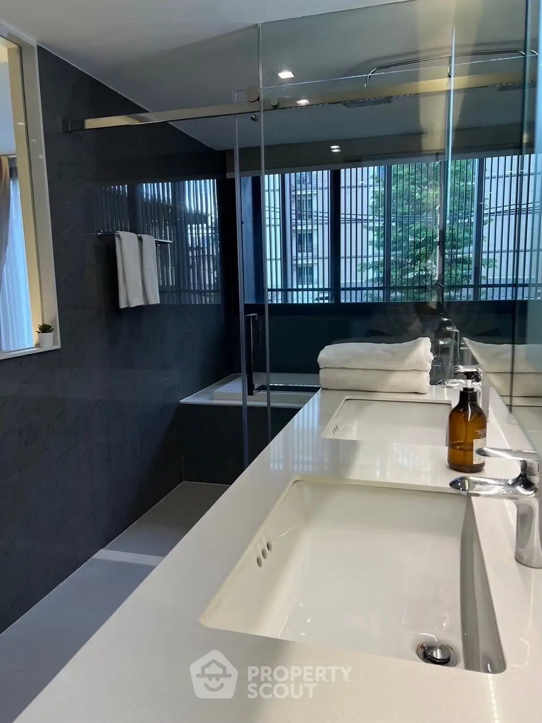 Modern bathroom with sleek design and large mirror