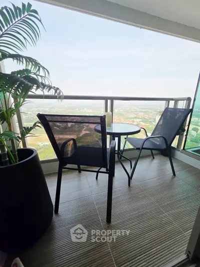 Spacious balcony with stunning view and modern outdoor seating