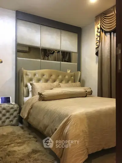 Luxurious bedroom with elegant decor and plush bedding