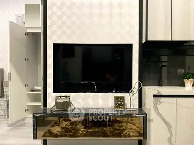 Modern living room with sleek TV setup and stylish decor