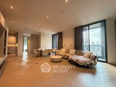 Spacious modern living room with city view and elegant furnishings