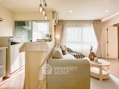 Bright modern living room with cozy sofa and stylish decor