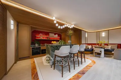 Luxurious modern kitchen with open layout and stylish island seating