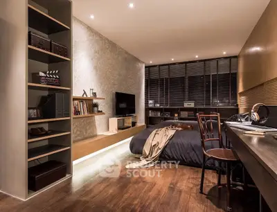Luxurious modern bedroom with stylish decor and ambient lighting, featuring a cozy bed and sleek wooden flooring.