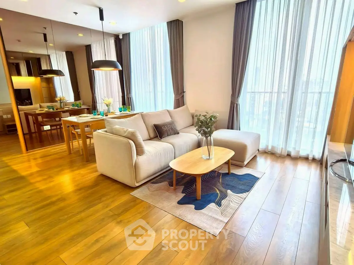 Spacious modern living room with elegant decor and natural light