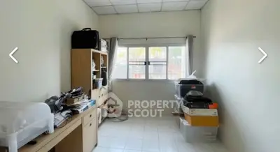 Spacious study room with ample natural light and organized storage solutions.
