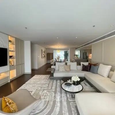 Luxurious and spacious living room with elegant decor and modern furniture, perfect for relaxation and entertainment.