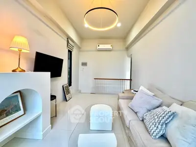 Modern living room with stylish decor and cozy seating area