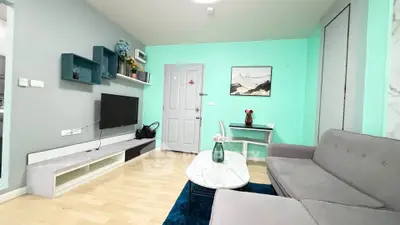 Modern living room with stylish decor and cozy seating area
