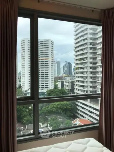 High-rise apartment with stunning city view through large window
