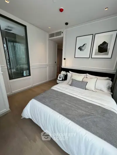 Elegant bedroom with modern decor and cozy ambiance