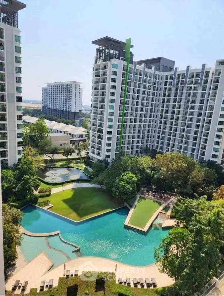 Luxurious high-rise condo with stunning pool and lush gardens