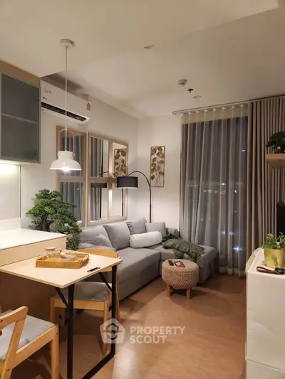 Cozy modern living room with stylish decor and natural light