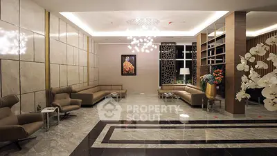 Luxurious modern living room with elegant decor and spacious seating area.