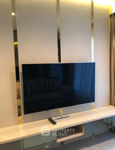 Modern living room with sleek TV setup and stylish decor