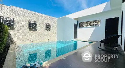 Modern private pool area with stylish design and sunny ambiance