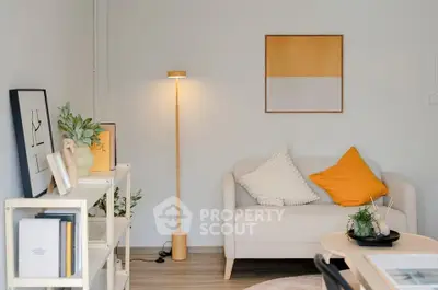 Modern living room with stylish decor and cozy seating area