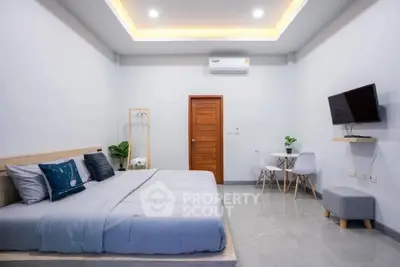 Modern bedroom with stylish decor and cozy ambiance